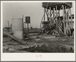 This pumping plant for irrigation is powered by a natural gas engine which operates at about half the cost of electricity. Tulare County, California