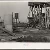 This pumping plant for irrigation is powered by a natural gas engine which operates at about half the cost of electricity. Tulare County, California