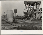 This pumping plant for irrigation is powered by a natural gas engine which operates at about half the cost of electricity. Tulare County, California