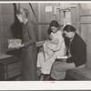 Hymn singing at meeting of Mothers' Club in Arvin migrant camp. California