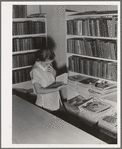 Arvin camp for migrant workers (Farm Security Administration-FSA) California. A small library in camp with Works Progress Administration (WPA) librarian in charge is now available to agricultural workers