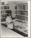 Arvin camp for migrant workers (Farm Security Administration-FSA) California. A small library in camp with Works Progress Administration (WPA) librarian in charge is now available to agricultural workers