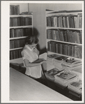 Arvin camp for migrant workers (Farm Security Administration-FSA) California. A small library in camp with Works Progress Administration (WPA) librarian in charge is now available to agricultural workers