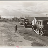 Looking from the camp to adjoining tract where the Farm Security Administration (FSA) has just completed forty homes to be occupied by low income workers. These homes represent a first step in stabilization of this group