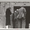 Destitute farm labor families come to Farm Security Administration (FSA) distributing depot to apply for food grant. Kern County, California