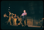 Iggie Wolfington [center] and unidentified others in the stage production The Music Man