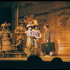 Robert Preston [right] and unidentified others in the stage production The Music Man