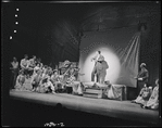 Robert Preston [center] and unidentified others in the stage production The Music Man
