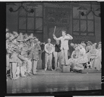 Robert Preston [center] and unidentified others in the stage production The Music Man