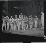 Robert Preston [right] and unidentified others in the stage production The Music Man
