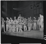 Robert Preston [right] and unidentified others in the stage production The Music Man