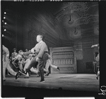 Iggie Wolfington [center] and unidentified others in the stage production The Music Man