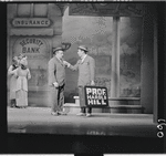 Iggie Wolfington, Robert Preston [center] and unidentified others in the stage production The Music Man