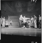 Iggie Wolfington [center] and unidentified others in the stage production The Music Man