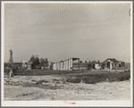 This family from Arkansas had one thousand dollras when they arrived in California. There are eleven children in family. They bought a forty acre piece of land on which they still owe one thousand dollars