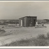Home of rural rehabilitation client, Tulare County, California. They bought twenty acres of raw unimproved land with a first payment of fifty dollars which was money saved out of relief budget (August 1936)