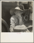 Douglas, Georgia. Wife of sharecropper in town to sell their crop at the tobacco auction