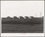 United States government camp for migratory workers (Farm Security Administration-FSA), Westley, California. Pre-fabricated steel shelters replace the use of tents and tent platforms in this newly constructed camp