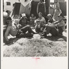 Westley, California. Migrant family in Farm Security Administration camp. Unable to obtain work in pea fields because of labor surplus in height of season