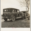 U.S. 99. Near Tulare, California. Entered California fall of 1938. En-route to pea harvest in Imperial Valley. Car broke-down. "Want to get back to Missouri if they can ever get the money"