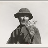 Cotton picker near Firebaugh, California