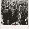 Listening to speeches at mass meeting of Works Progress Administration (WPA) workers protesting congressional cut of relief appropriations. San Francisco, California