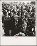 Listening to speeches at mass meeting of Works Progress Administration (WPA) workers protesting congressional cut of relief appropriations. San Francisco, California