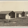 United States government camp for migrant workers (Farm Security Administration-FSA), Westley, California. Pre-fabricated steel shelters replace the use of tents and tent platforms in this newly constructed camp