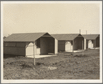 United States government camp for migrant workers (Farm Security Administration-FSA), Westley, California. Pre-fabricated steel shelters replace the use of tents and tent platforms in this newly constructed camp