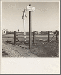 Near Fresno, California. Migrants' tents are a common sight along the right of way of the Southern Pacific