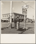Calipatria, Imperial Valley. Idle pea pickers discuss prospects for work. California