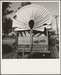Near Holtville, Imperial Valley. Again the covered wagon. In migratory carrot puller's camp