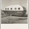 Farm Security Administration (FSA) migratory labor camp, Calipatria, Imperial Valley, California. Part of mobile camp unit, moving from harvest to harvest with workers ...