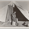 Young migrant mother who lives in one of the tents. California. Farm Security Administration (FSA) emergency camp. Calipatria