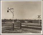 Migrants' tents are a common sight along the right of way of the Southern Pacific. Near Fresno, California