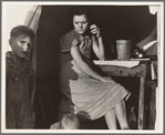 Calipatria, Imperial Valley, In Farm Security Administration (FSA) emergency migratory labor camp. Daughter of ex-tenant farmers on thirds and fourths in cotton. Had fifty dollars when set out ...