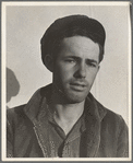 Son-in law of migratory family in Farm Security Administration (FSA) labor camp. Calipatria, Imperial Valley, California