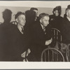 Salvation Army, San Francisco, California. In the hall an audience awaits the return of the army for the meeting to open