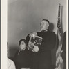 Meeting closes with adjutant Nock selling Easter edition of the "War Cry." Salvation army, San Francisco, California