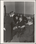 Meeting opens with taking the collection. Army contributes (about one dollar and fifty cents) again, as well as the audience. Salvation Army, San Francisco, California