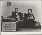 Adjutant and his wife sing. Salvation Army, San Francisco, California