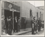 Salvation Army, San Francisco, California. Men come out of adjacent bar to watch, and return to the bar. (San Francisco is said to drink more whiskey per capita than any other city in the United States)