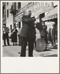 "Power of the Lord" preaching by a "soldier" saved twelve years before, and with army ever since. Salvation Army, San Francisco, California