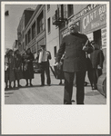 "Power of the Lord" preaching by a "soldier" saved twelve years before, and with army ever since. Salvation Army, San Francisco, California