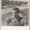 Farm-reared youth with no opportunity on the farm, now travelling single among the migrants. Kern County, California