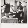 Texas woman in carrot pullers' camp. Imperial Valley, California. This sunbonnet is typical of women who came from Texas