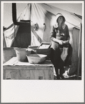 Texas woman in carrot pullers' camp. Imperial Valley, California. This sunbonnet is typical of women who came from Texas