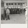 Outside Farm Security Administration (FSA) grant office during the pea harvest. Calipatria, California. During the spring of 1938, for the first time the labor surplus had grown so large that relief grants were necessary even during the peak of harvest