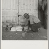 Outside the Farm Security Administration (FSA) grant office during pea harvest. Calipatria, California. During the spring of 1938 for the first time the labor surplus has grown so large that relief grants were necessary even during the peak of harvest
