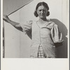 In a carrot pickers' camp, Imperial Valley, California. Woman from Broken Bow, Oklahoma. "Are you going to take my picture, wait till I get my hair combed"